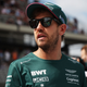 A photo of Sebastian Vettel in his Aston Martin F1 gear.